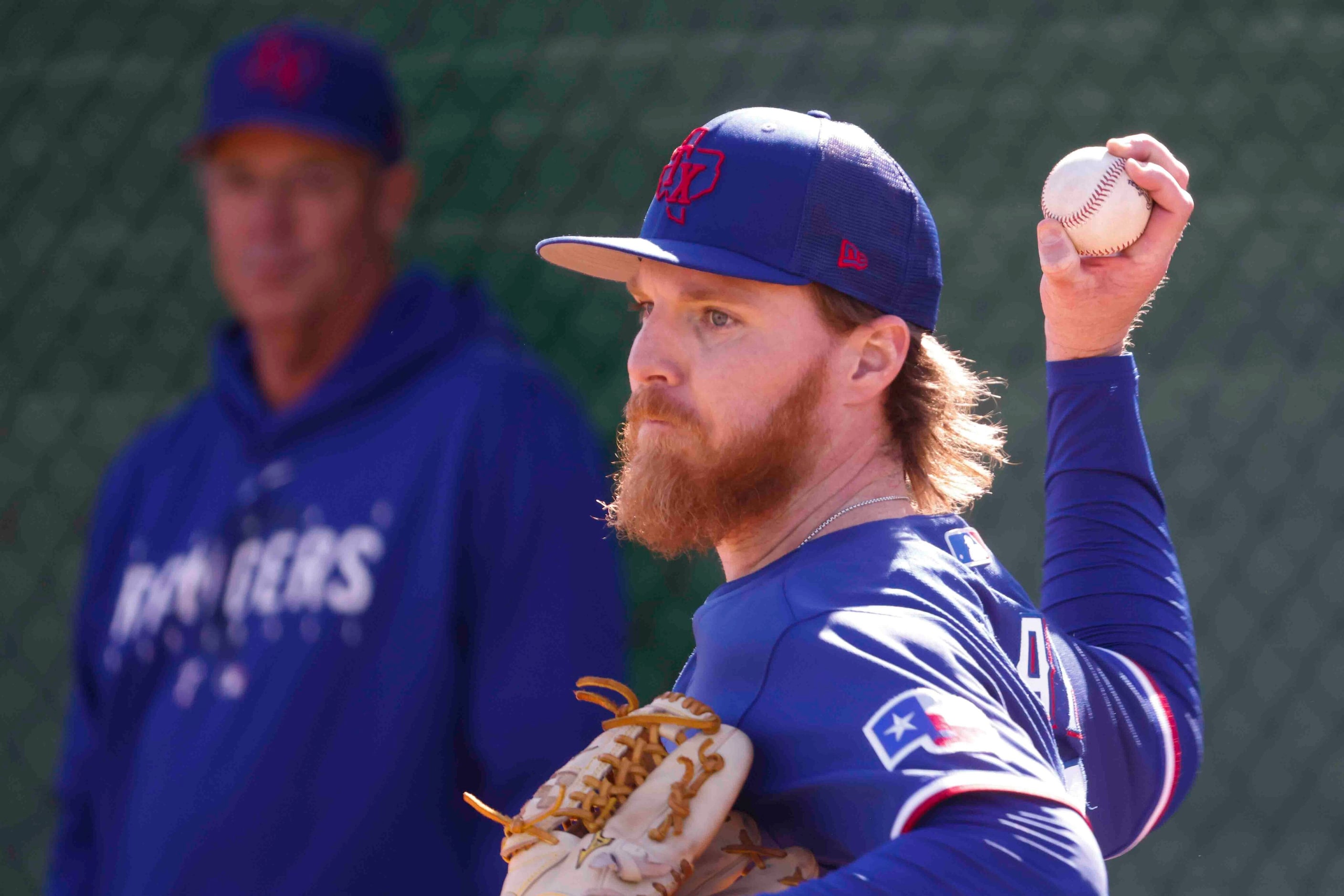 Texas Rangers right handed pitcher Jon Gray practices pitching during a spring training...