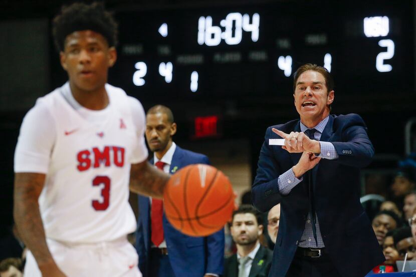 Southern Methodist Mustangs head coach Tim Jankovich calls out a play as Southern Methodist...