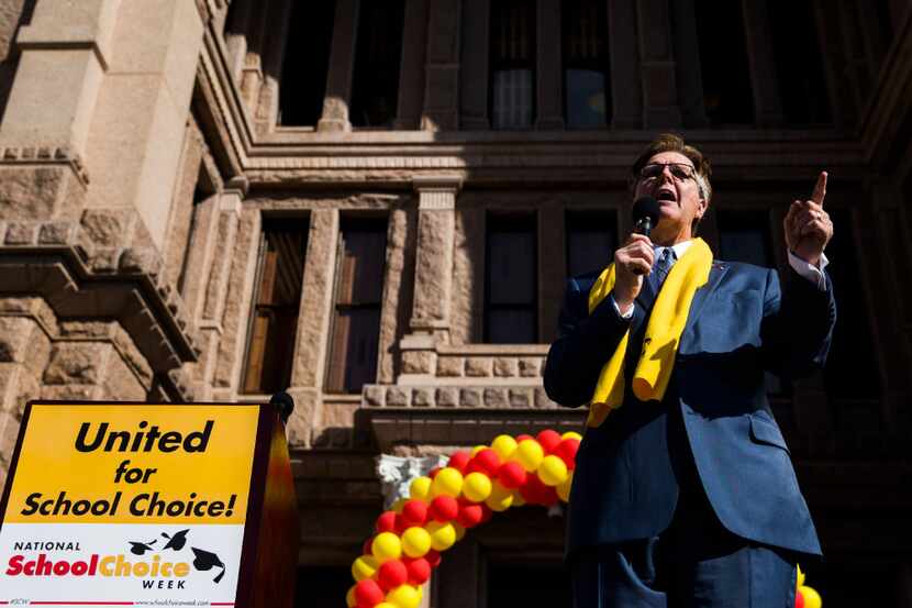 Texas Lieutenant Governor Dan Patrick speaks as demonstrators rally to show their support...