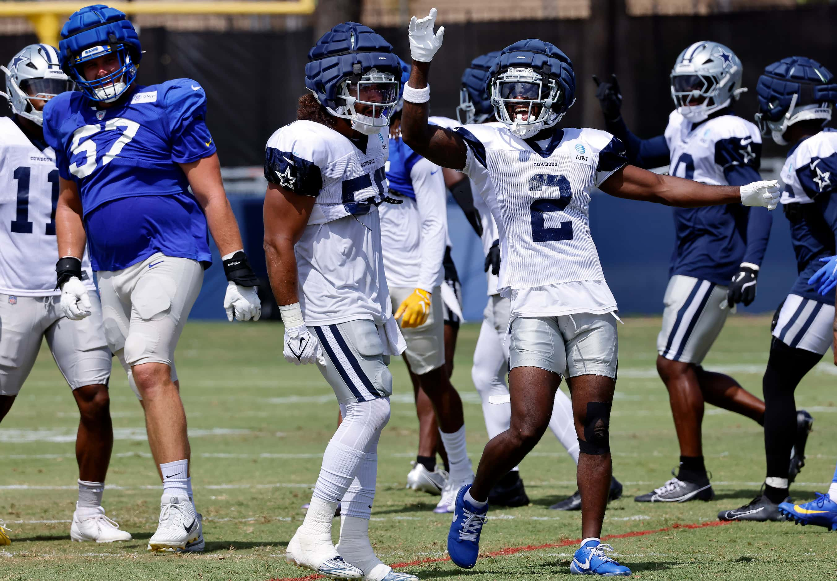 Dallas Cowboys cornerback Jourdan Lewis (2) celebrates linebacker Eric Kendricks’ (50) big...