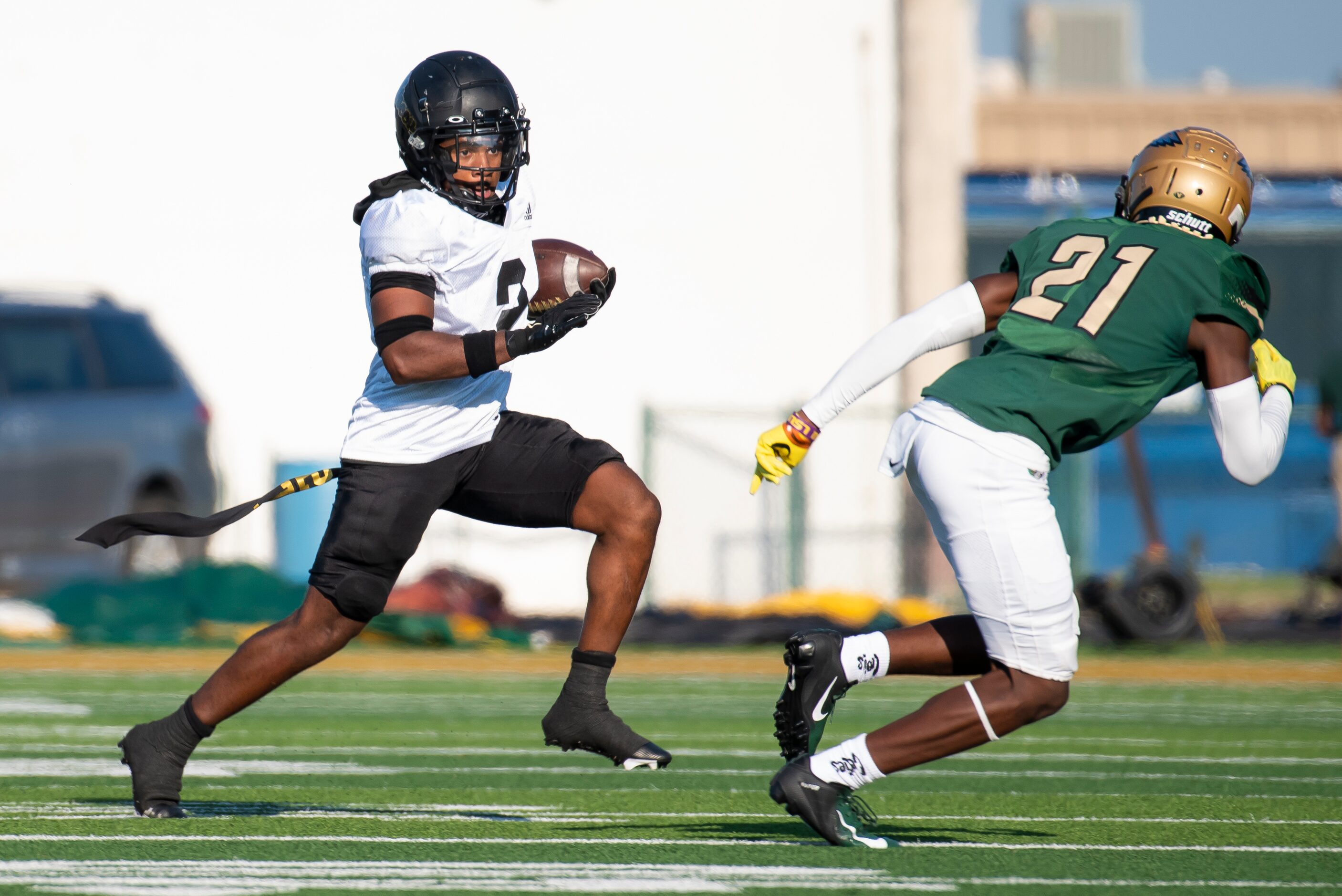 South Oak Cliff senior Tedrick Williams (2) rushes with the ball as DeSoto junior Mario...