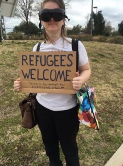  Heidi Hickman stages a counterprotest against the anti-refugee group. (Sarah Mervosh/Staff)