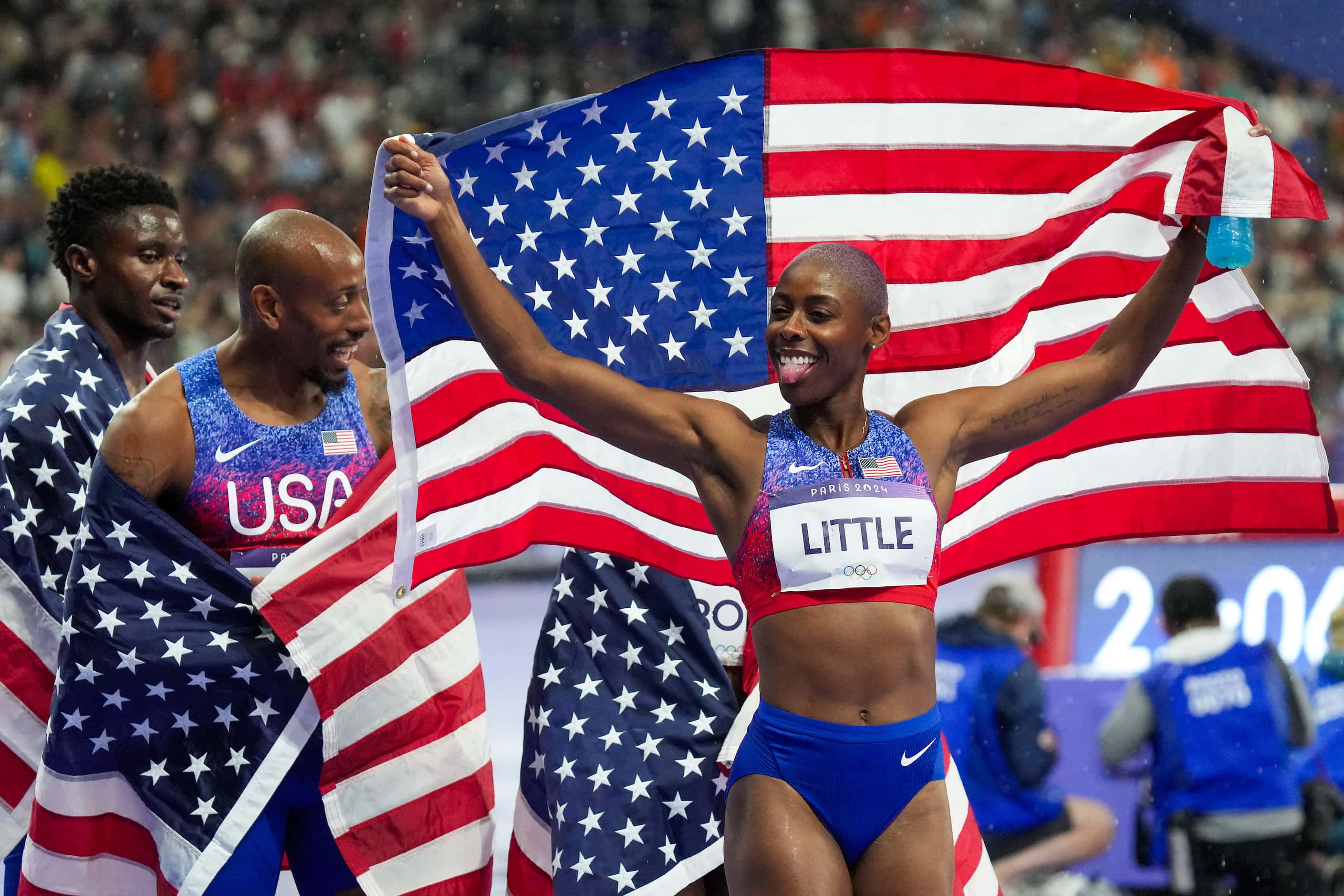 Shamier Little of the United States celebrates with teammates after winning the silver medal...