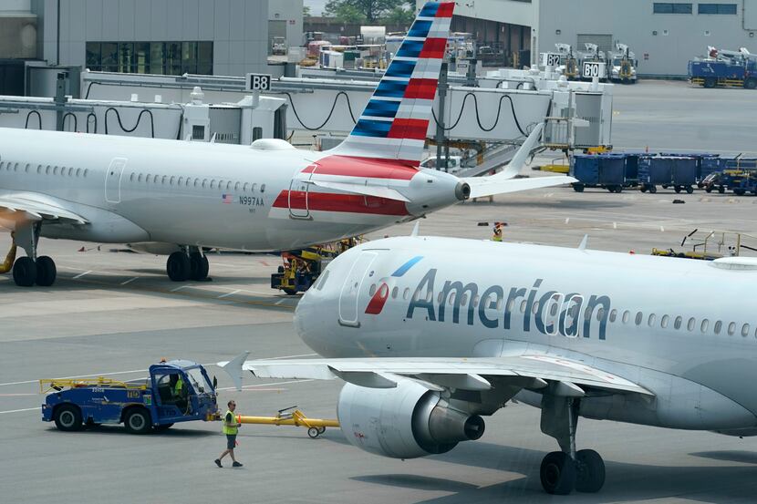 American Airlines jets prepare for departure.