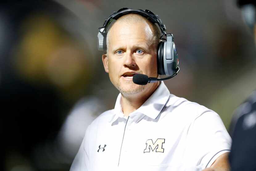 Mansfield football coach Daniel Maberry is pictured on the sideline during a game against...