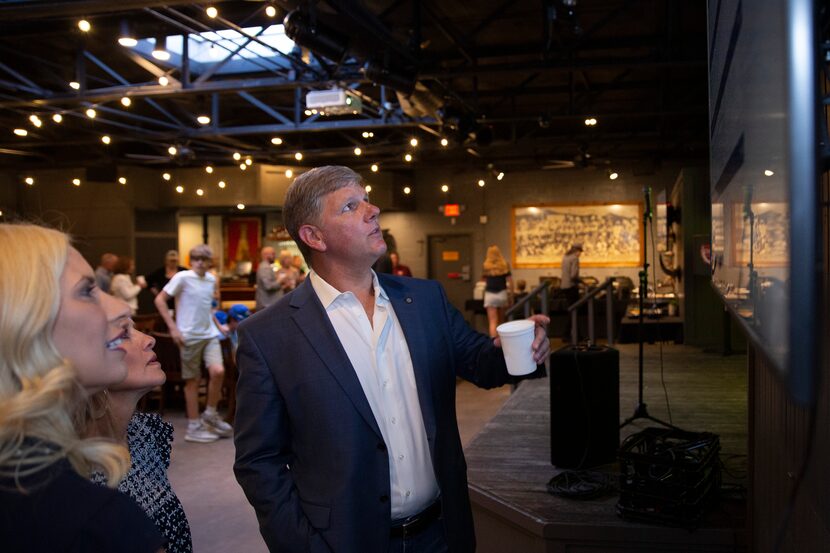 District 14 Councilman David Blewett (right) watches the election results as reported during...