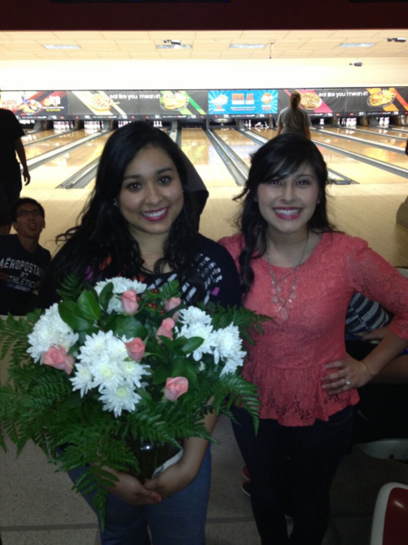 Lupita Rios (right) brought flowers to Esmeralda Cortez as a thank you during the program's...