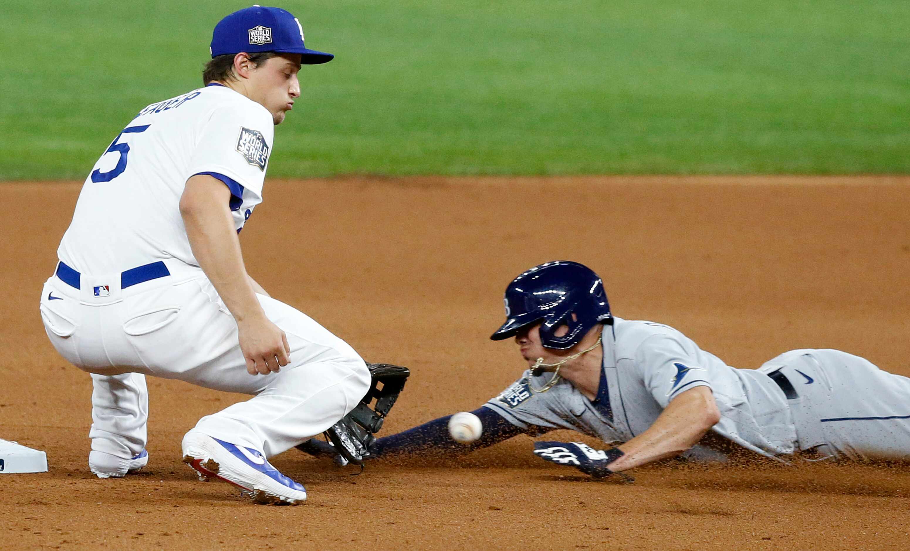 Tampa Bay Rays Willy Adames (1) is caught stealing as he's tagged out by Los Angeles Dodgers...