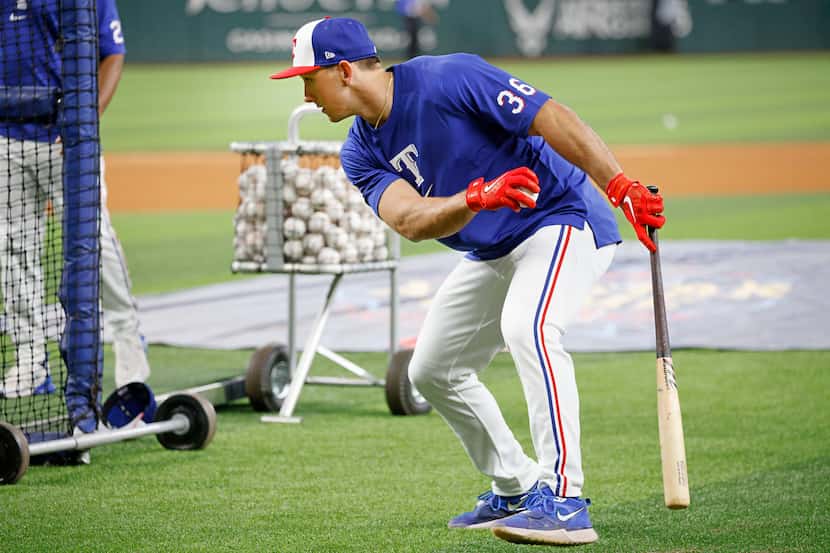 Texas Rangers outfielder Wyatt Langford (36) takes batting practice before the team’s home...