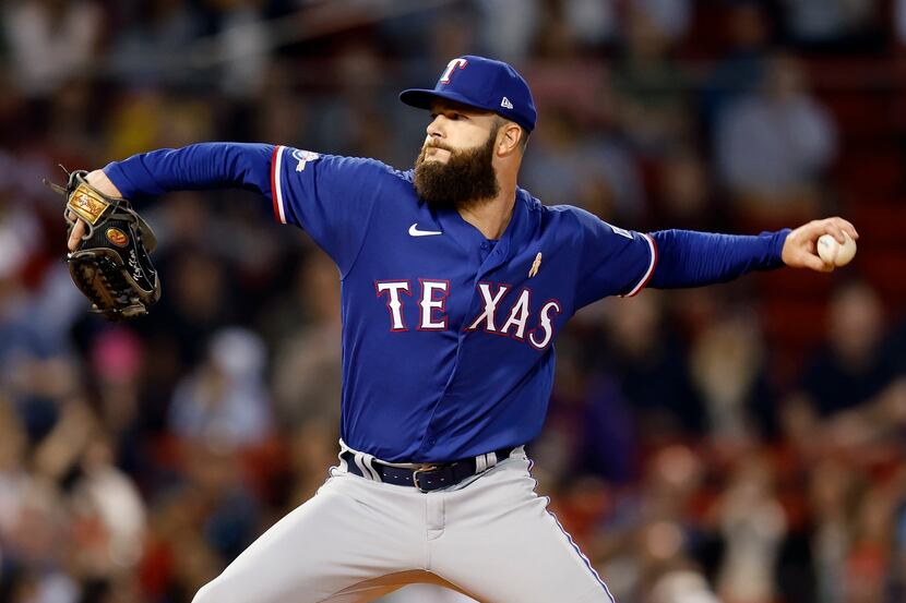 Texas Rangers' Dallas Keuchel pitches during the first inning of a baseball game against the...