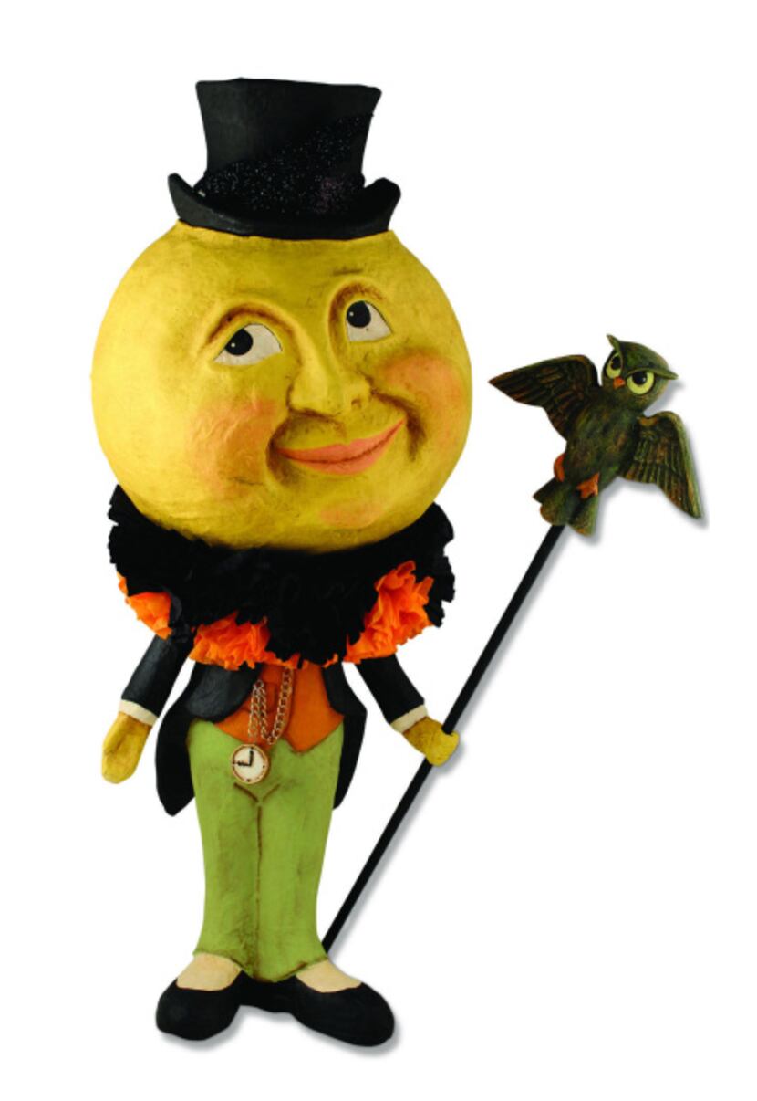 Man in the moon. A whimsical moon-faced man stands ready to welcome costumed children. 24.5...