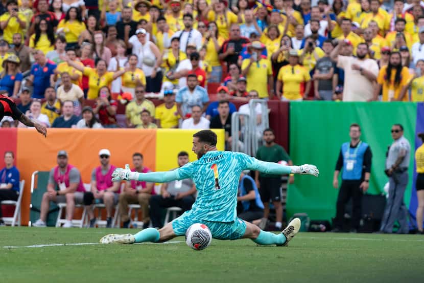U.S. goalkeeper Matt Turner gives up a goal to Colombia forward Luis Díaz during the second...