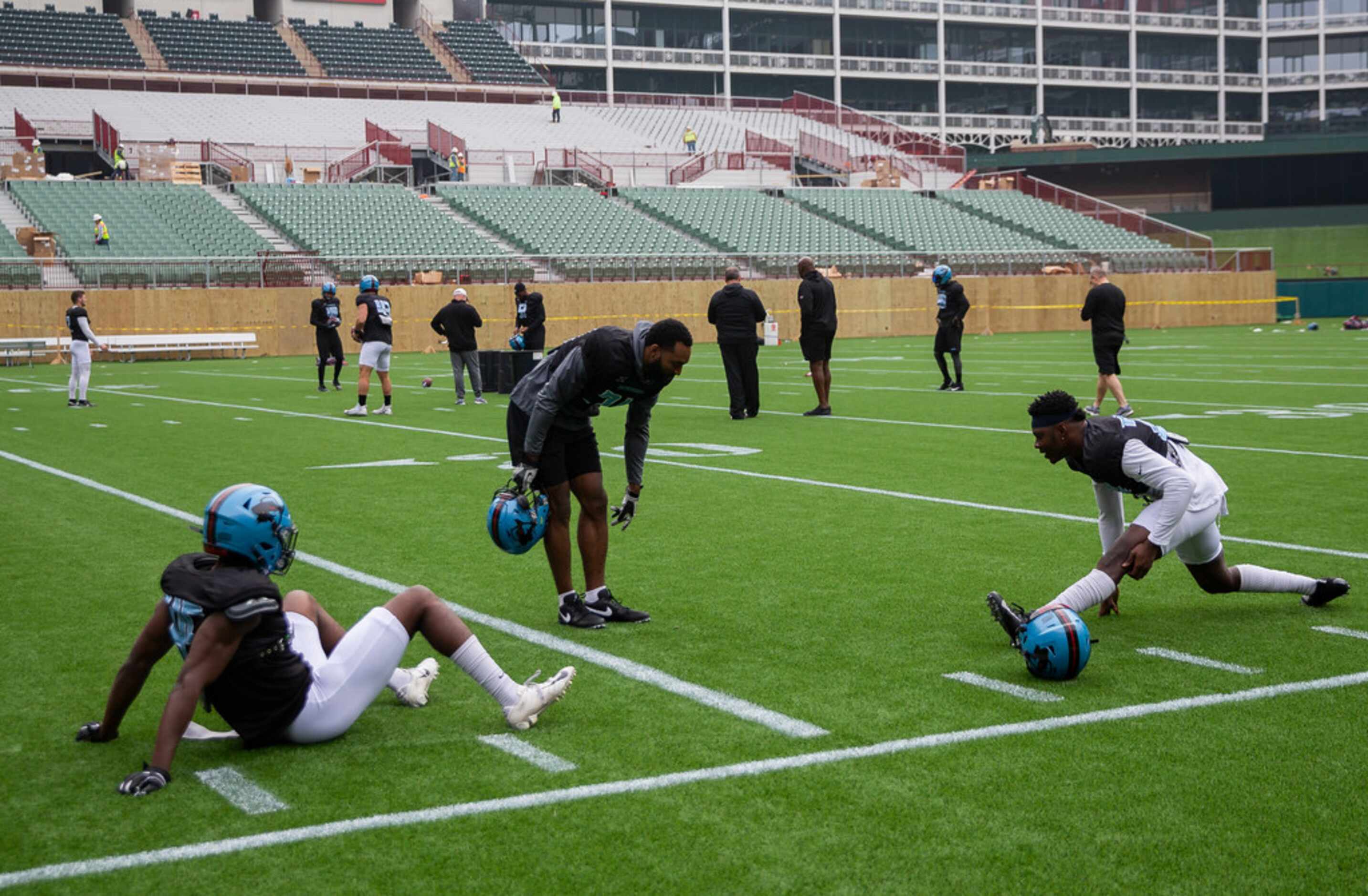 The Dallas Renegades stretch before practice on Jan. 27, 2020 at Globe Life Park in...