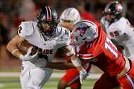 Colleyville Heritage's Braden Blueitt (8) is tackled by Grapevine's Tatum Evans (11) during...