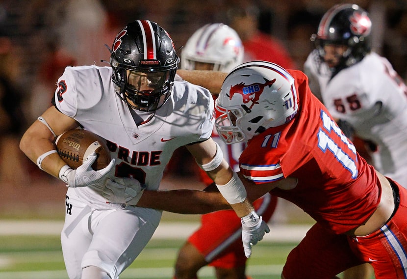 Colleyville Heritage's Braden Blueitt (8) is tackled by Grapevine's Tatum Evans (11) during...