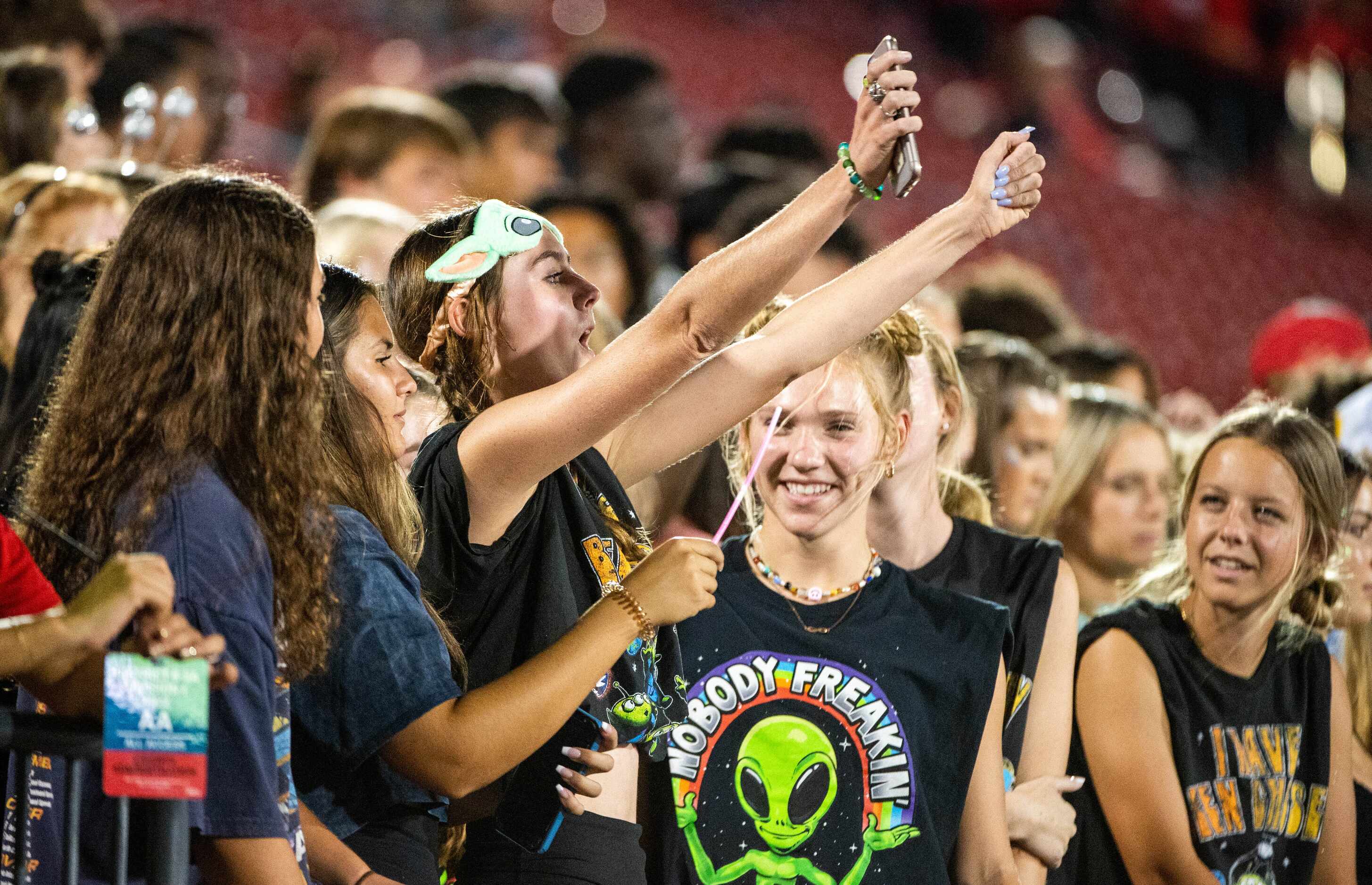 Frisco Liberty students watch a high school football game between Frisco Liberty and Frisco...