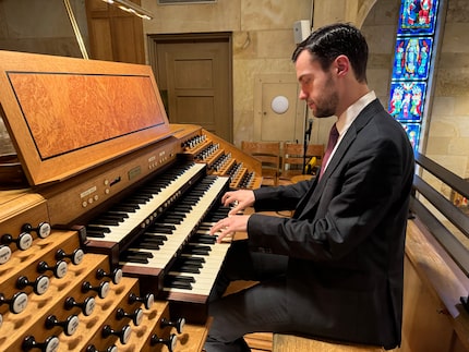 Nathan Laube at the Juget-Sinclair organ in Christ the King Catholic Church on Oct. 27, 2024.