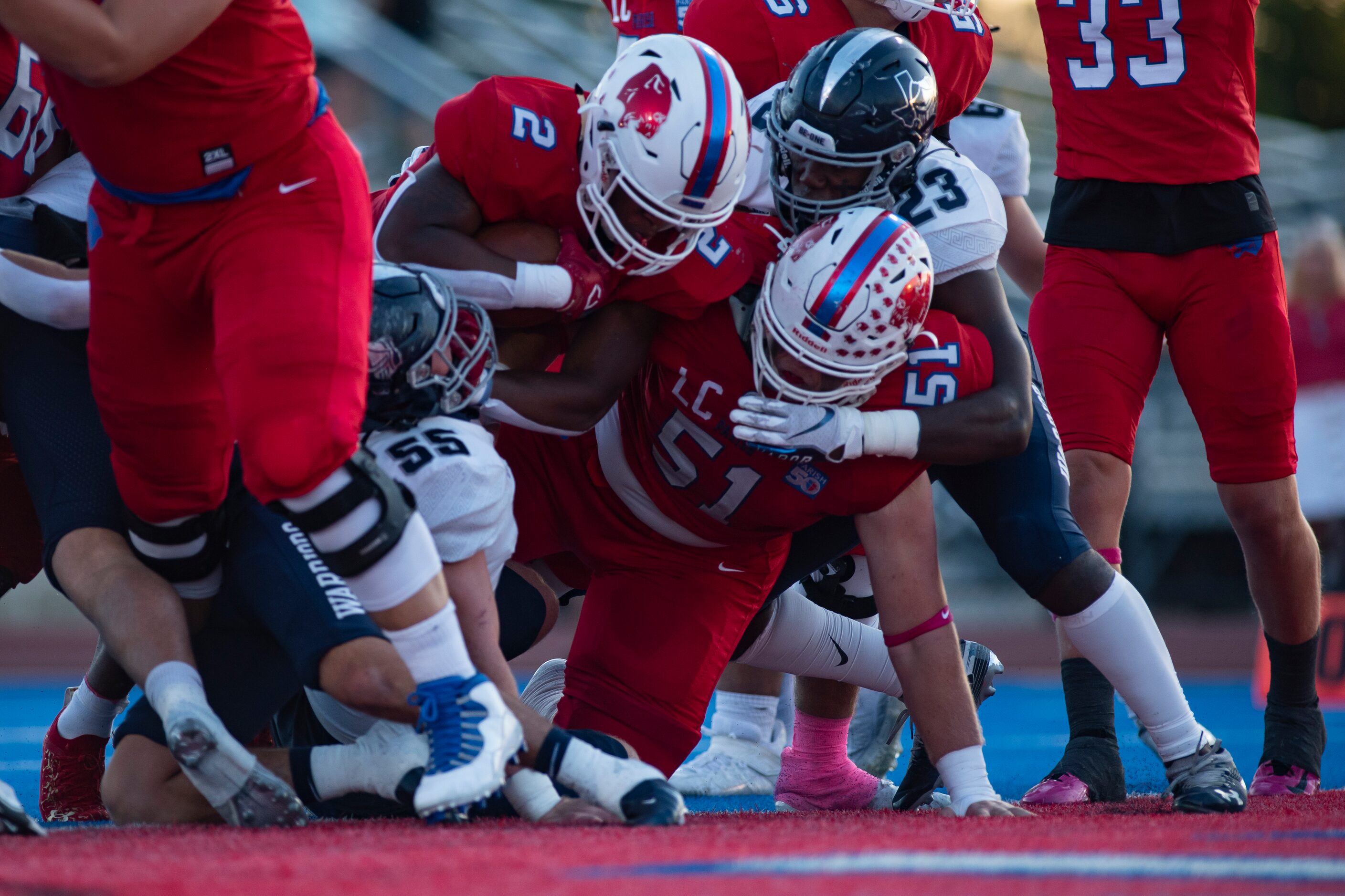 Parish Episcopal senior Andrew Paul (2) crashes into the end zone to score a touchdown...