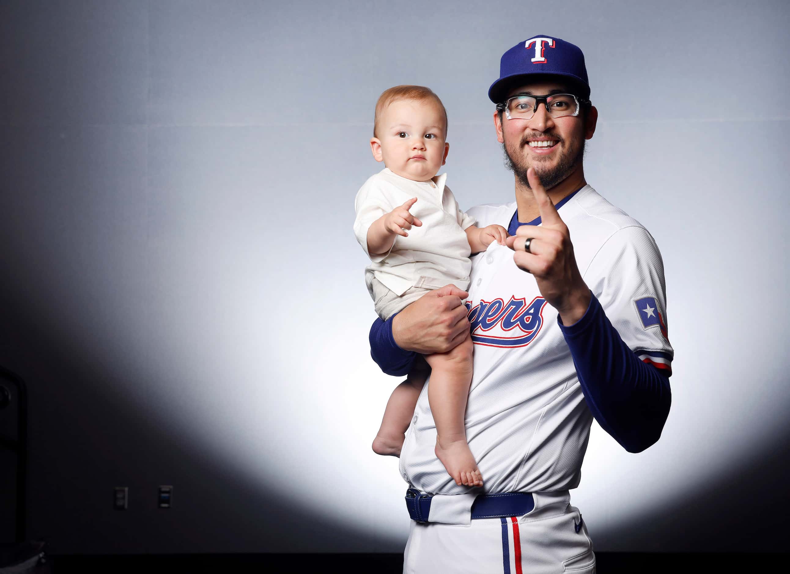 Texas Rangers Dane Dunning and his son Mack at Globe Life Field in Arlington, Texas, May 15,...