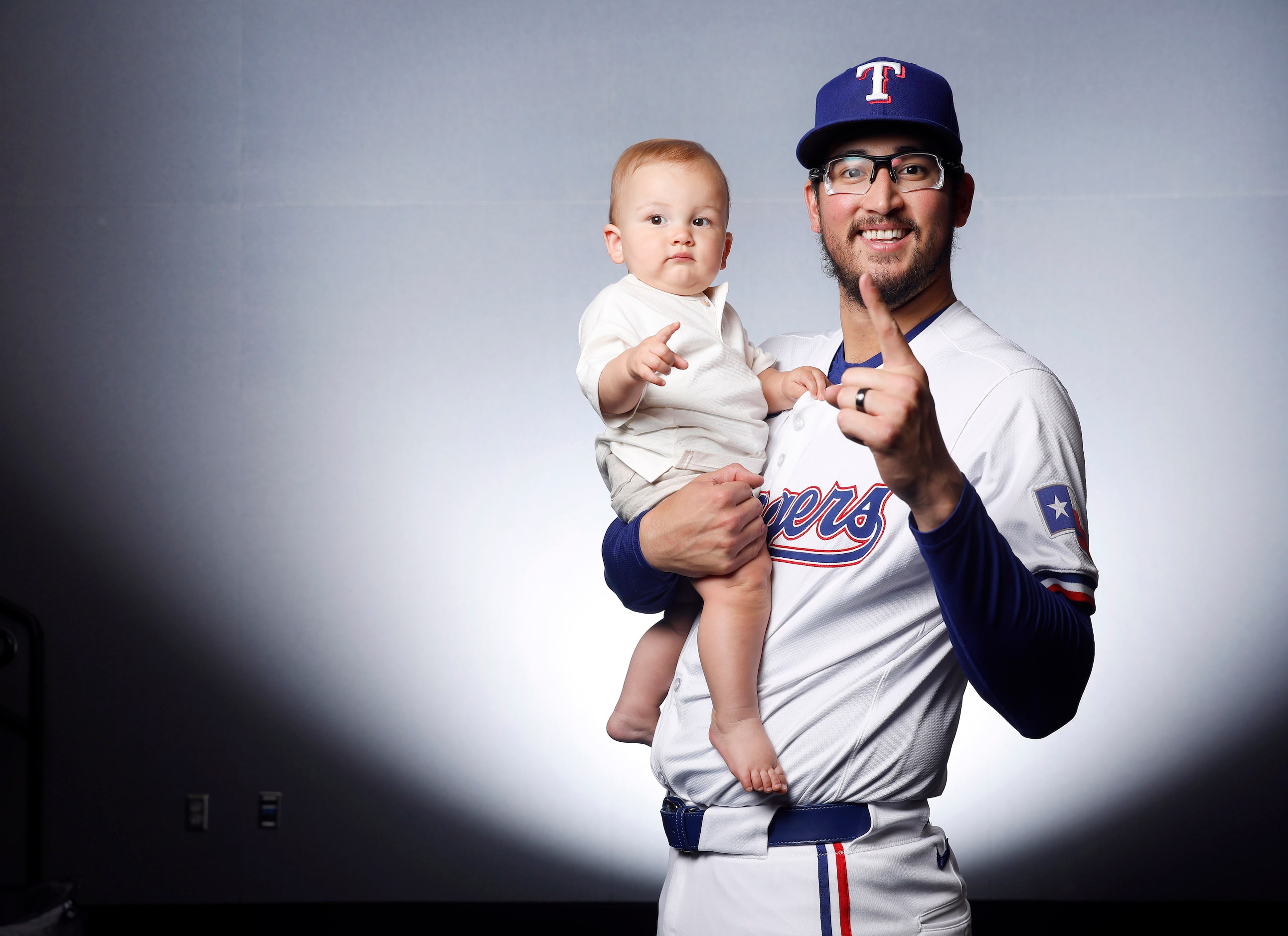 Texas Rangers Dane Dunning and his son Mack at Globe Life Field in Arlington, Texas, May 15,...