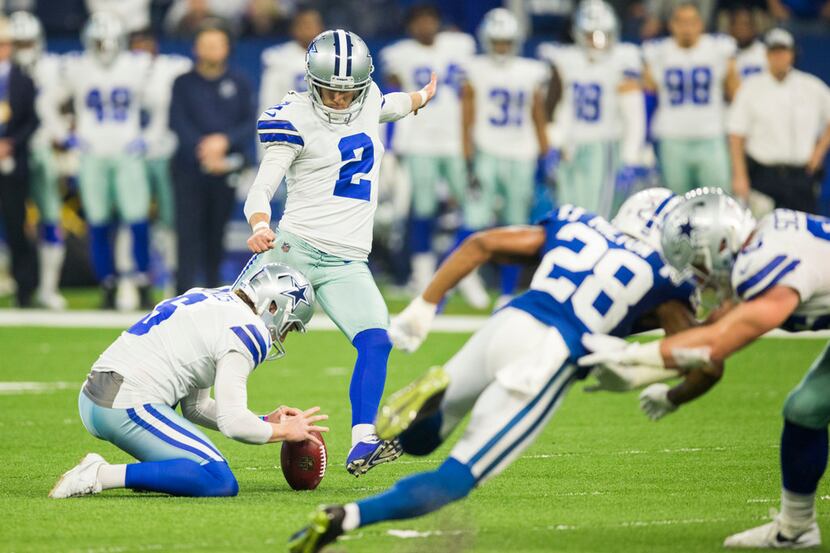 Dallas Cowboys kicker Brett Maher (2) attempts a field goal, which was deflected and run...
