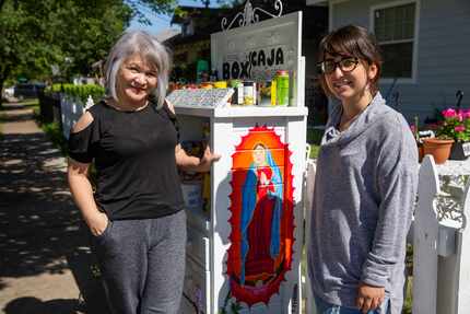 Lisa Padilla (left) and Amber Skye Padilla pose for a photo in front of their "Blessing Box"...