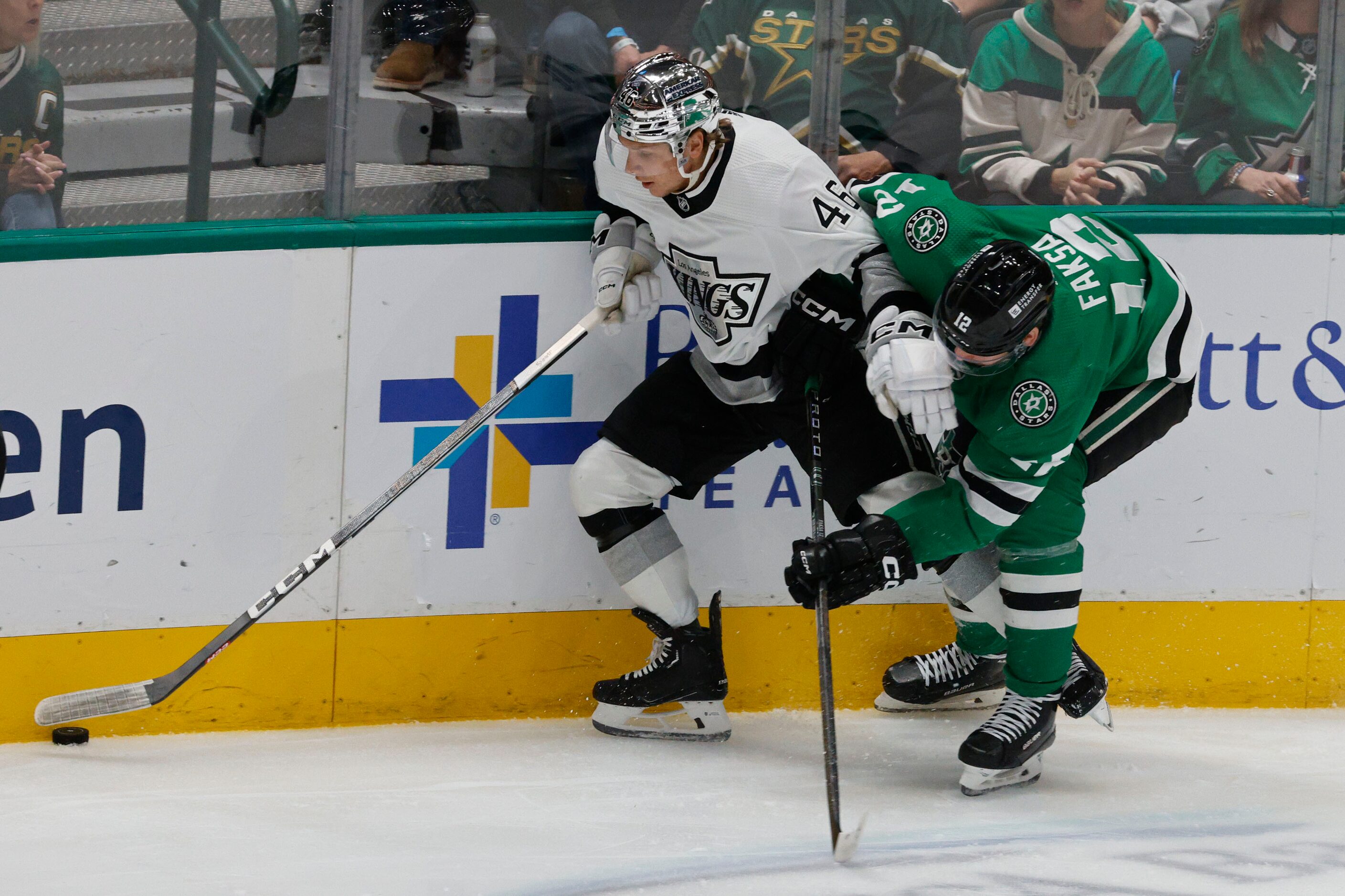 Dallas Stars center Radek Faksa (12) tangles with Los Angeles Kings center Blake Lizotte...