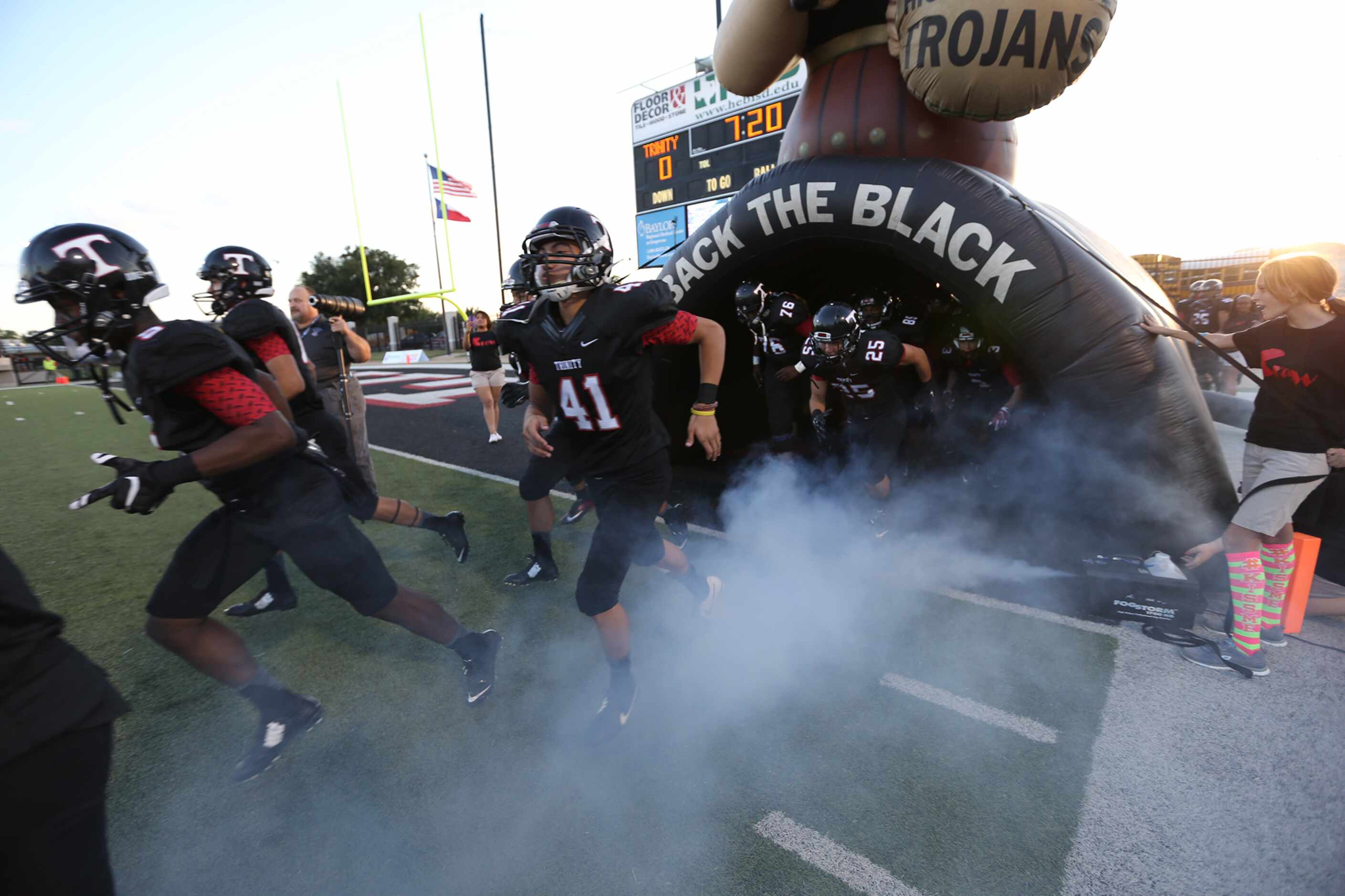 Trinity High School takes the field prior to game action between Euless Trinity School and...