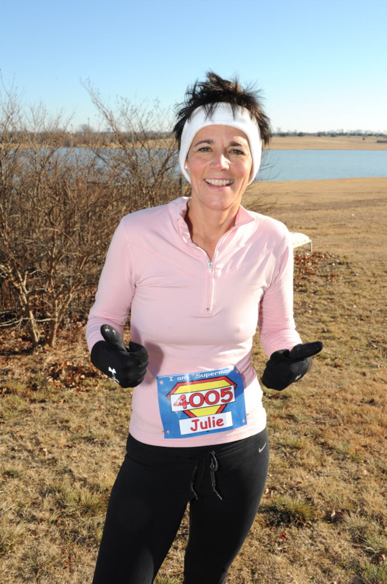 Julie Anderson cools down after the Superman 5k Run at Caruth Lake Park on December 29,...