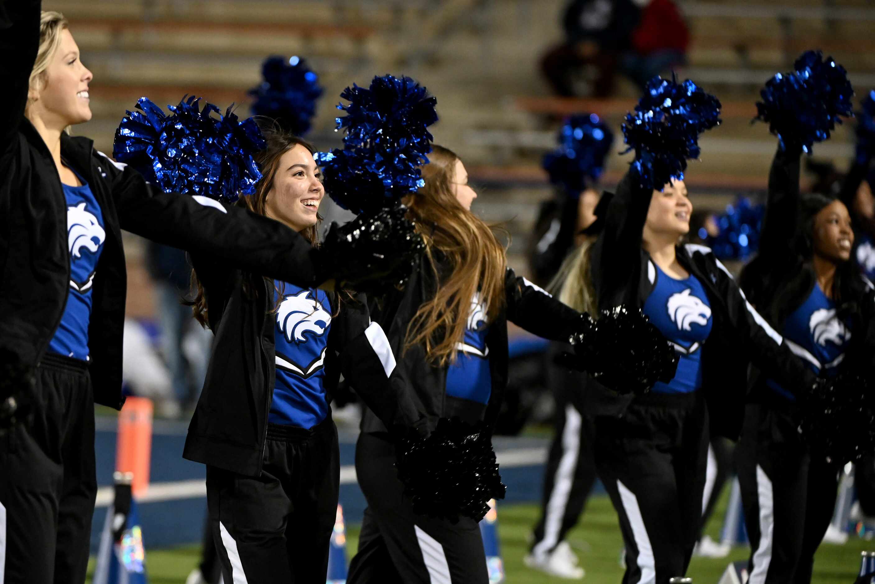 Plano West cheerleaders perform in the first quarter of a Class 6A Division I bi-district...
