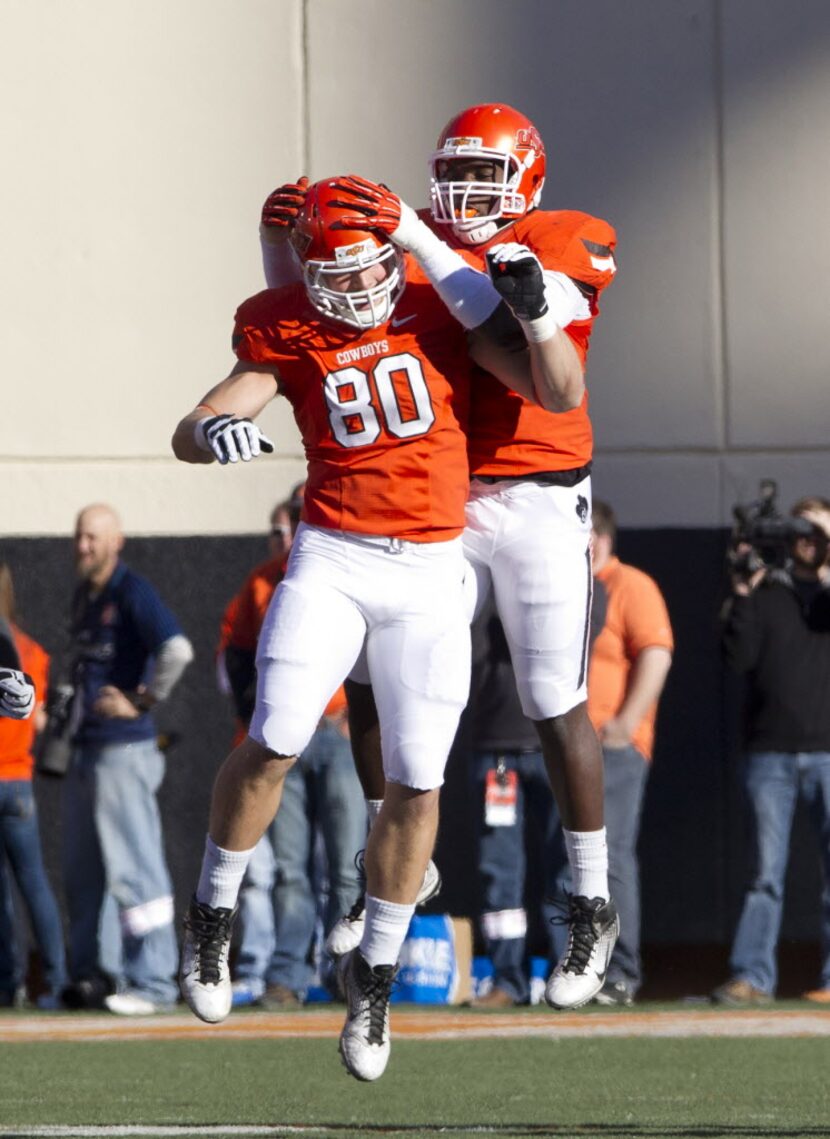 Nov 17, 2012; Stillwater OK, USA; Oklahoma State Cowboys defensive end Cooper Bassett (80)...