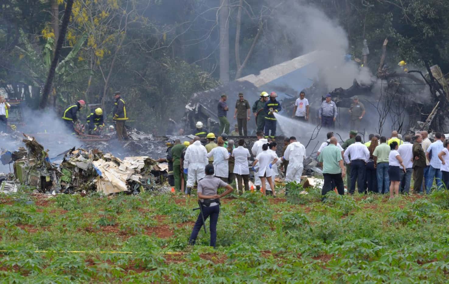 Picture taken at the scene after a Cubana de Aviacion aircraft crashed after taking off from...