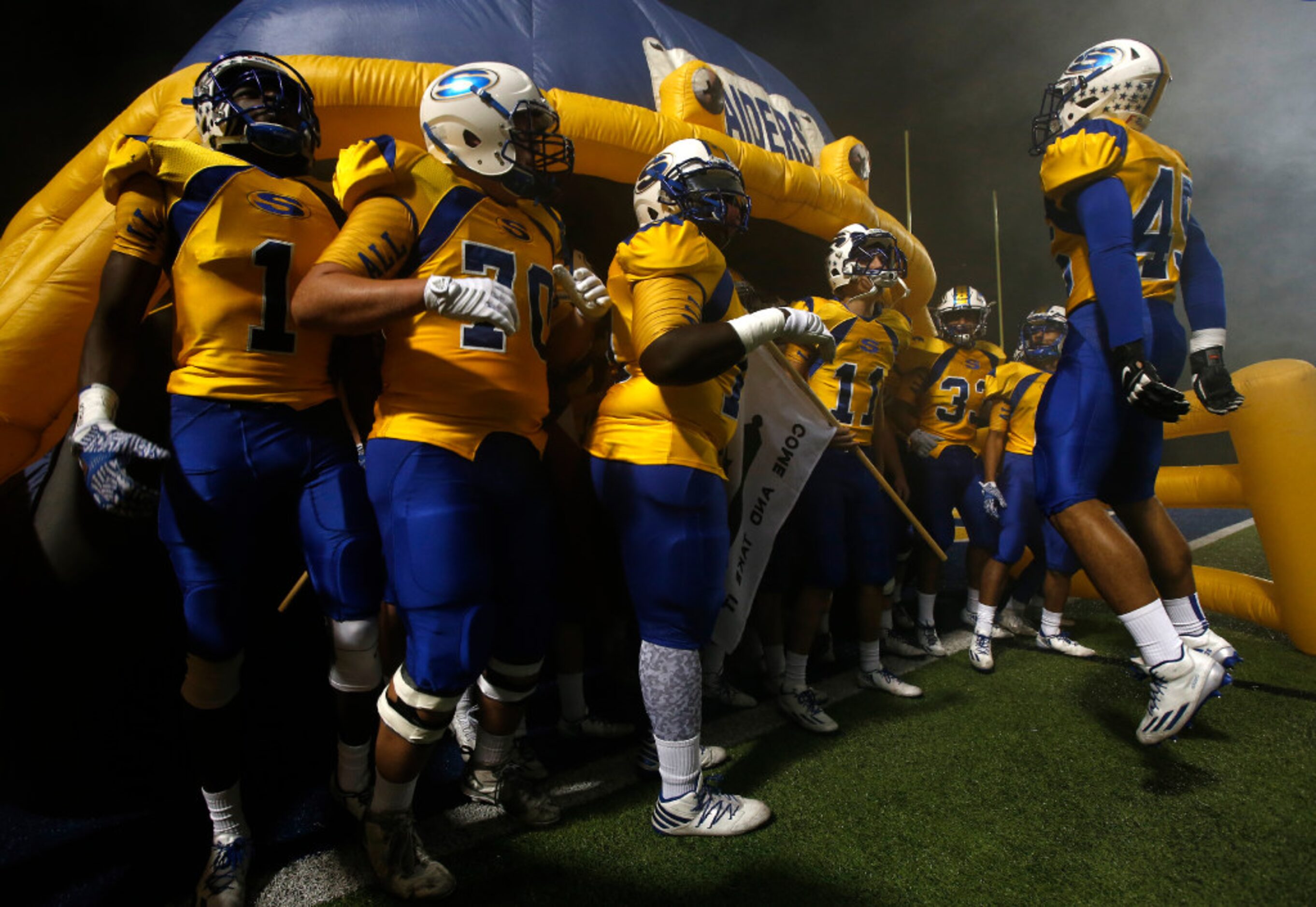 Sunnyvale defensive lineman A.J. Delgado (45) leads his team before the start of their high...