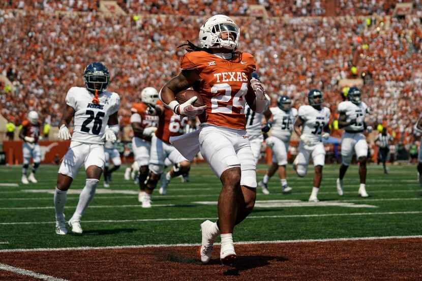 Texas running back Jonathon Brooks (24) runs for a touchdown against Rice during the first...