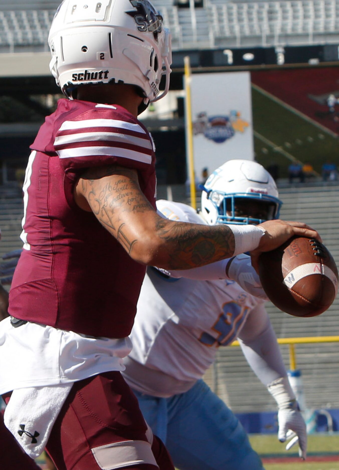 Texas Southern quarterback Devin Williams (2) looks to pass out of the end zone as Southern...