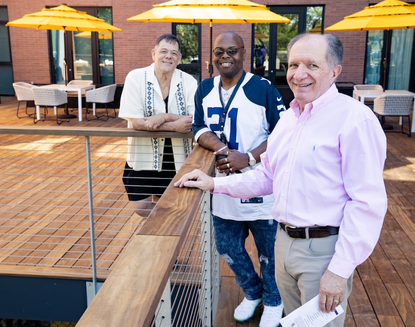 From left, Residents Stephen Rouse, Quincy Winn and Jack McCroskey smile as they pose for a...