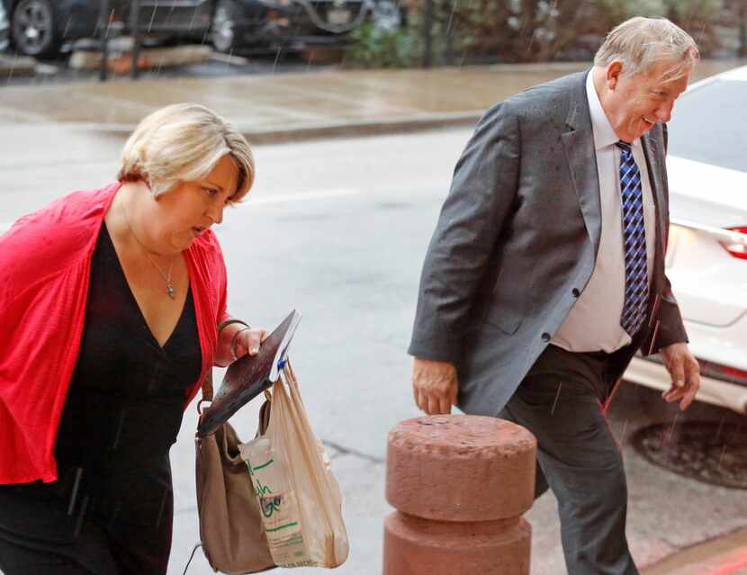 Jerry Shults and his daughter, Amy Herrig of the Gas Pipe arrive at the Earle Cabell federal...