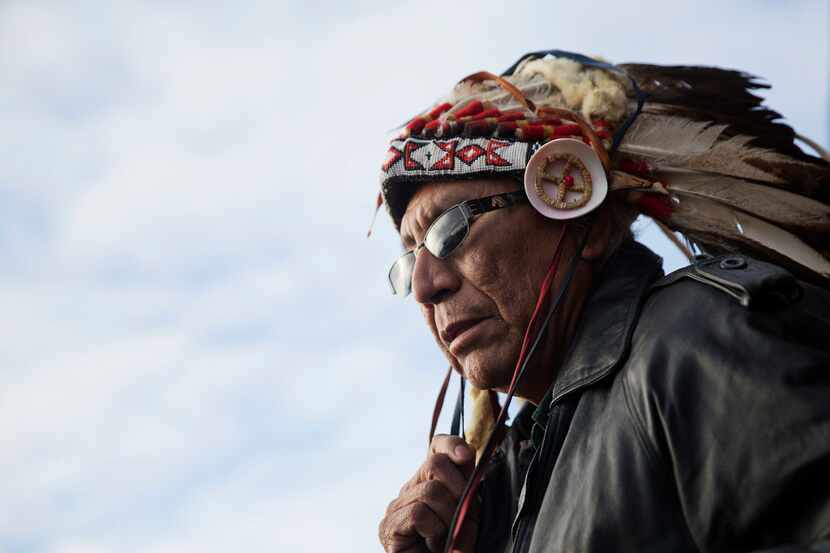 Chief Arvol Looking Horse, a spiritual leader of the Great Sioux Nation, puts on his...