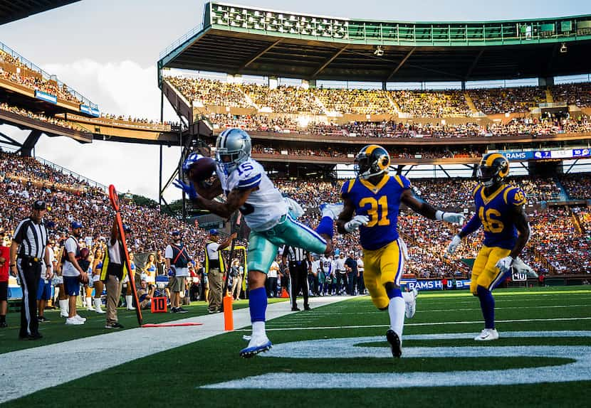 Dallas Cowboys wide receiver Devin Smith (15) catches a pass in the end zone for a touchdown...