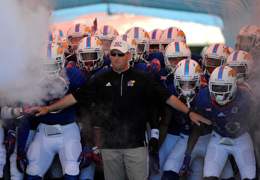 LAWRENCE, KS - SEPTEMBER 10: Head coach David Beaty of the Kansas Jayhawks prepares to lead...