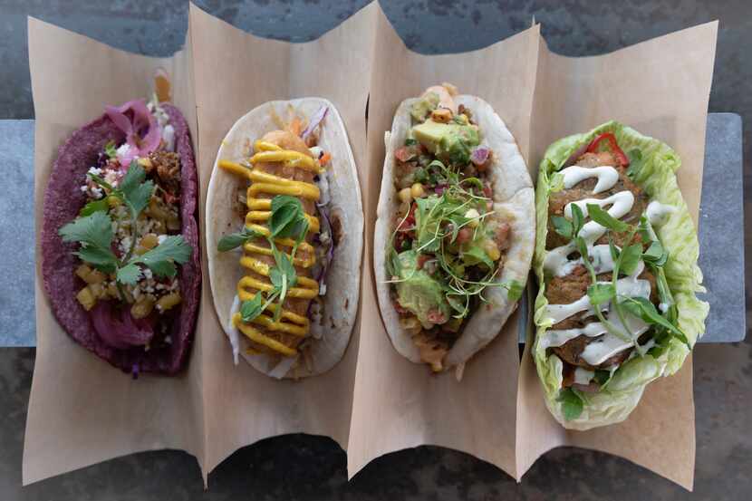 Tacos spanning Fish n' chips (#16), slow roasted Angus brisket (#12) and falafel (#6) are...