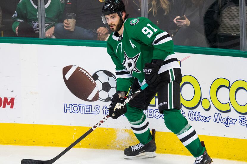 Dallas Stars center Tyler Seguin (91) looks for a pass during the third period of an NHL...