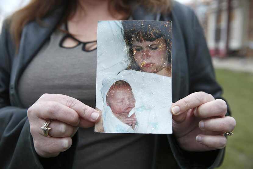 
“This is my first son,” Allison Gooch said, holding the photo returned to her by Tutt....