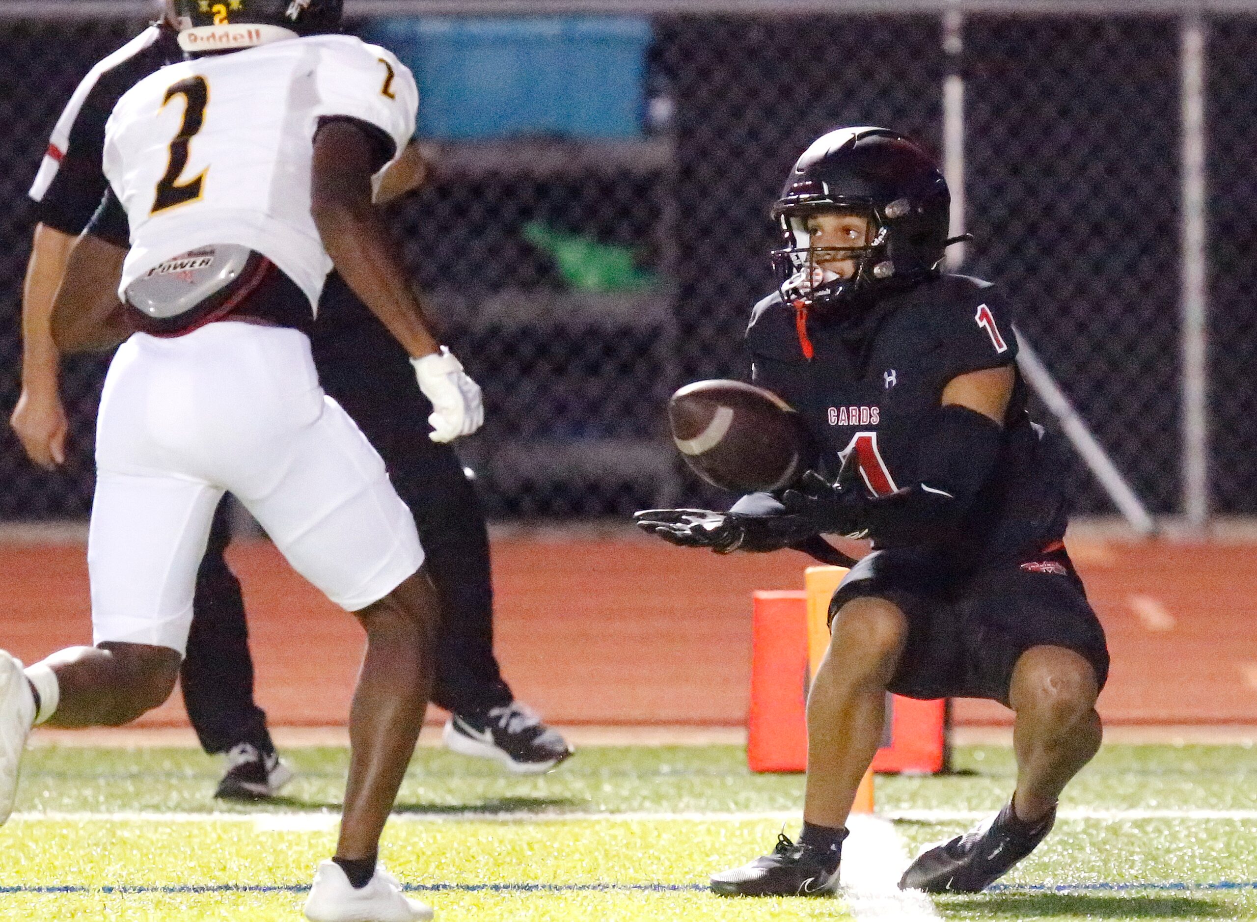 Melissa High School wide receiver Jayvon Smith (1) catches a pass on the goal line for a...