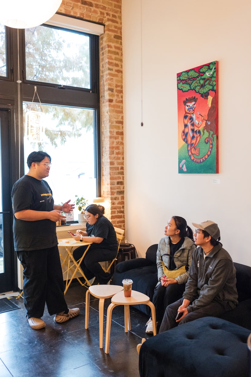 Alyx Nguyen, owner (left to right) talks to Christina Bui and
Stefan Tsai during a pop-up...