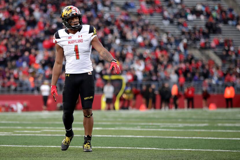 FILE - Maryland wide receiver D.J. Moore (1) lines up on the line of scrimmage against...