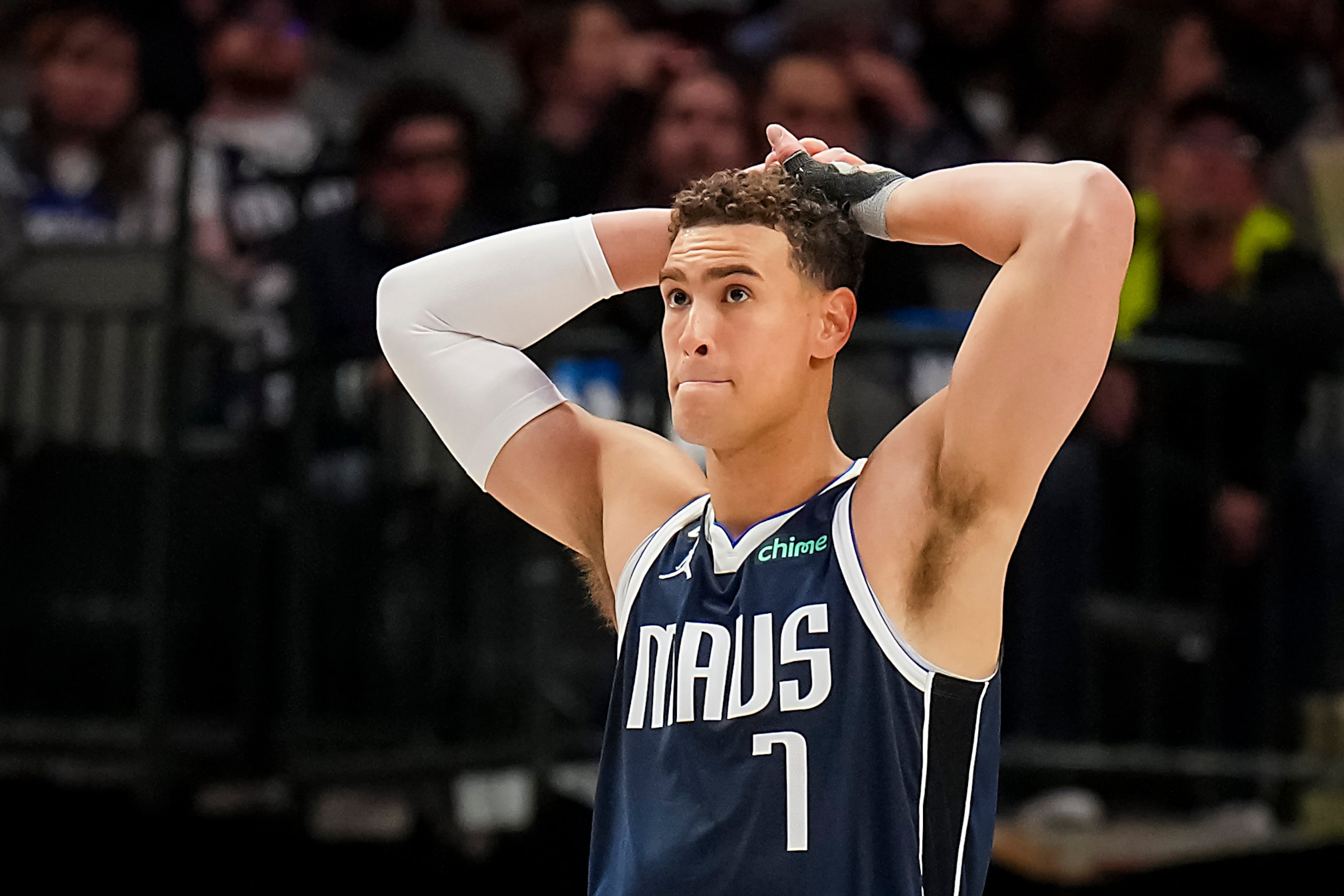 Dallas Mavericks center Dwight Powell (7) reacts after fouling out of the game during the...