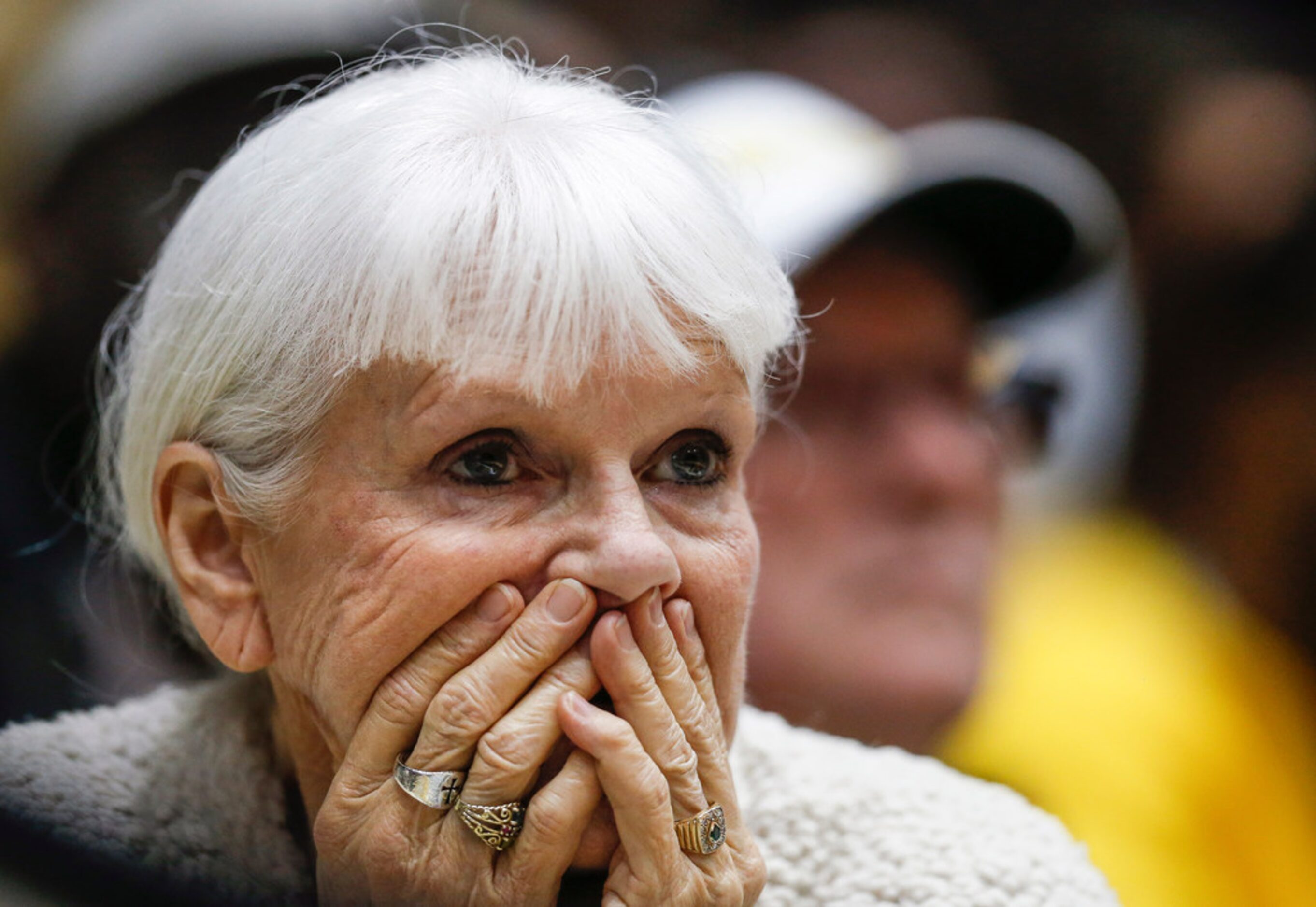 A Mount Pleasant fan anxiously watches the final moments of the Tiger's loss to Kimball...