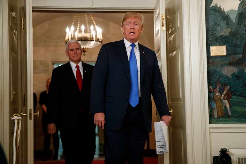 President Donald Trump and Vice President Mike Pence arrive for an event Thursday to...