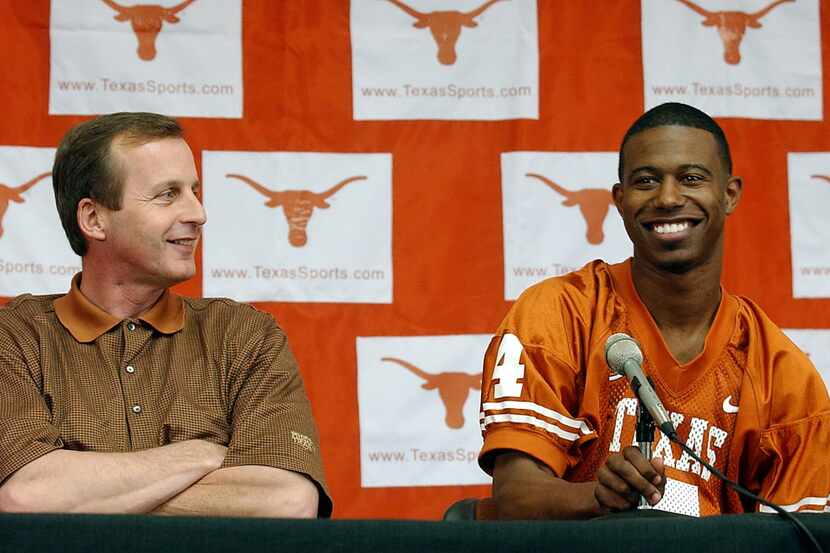  T.J. Ford, right, smiles during a news conference  on May 1, 2003, as coach Rick Barnes...